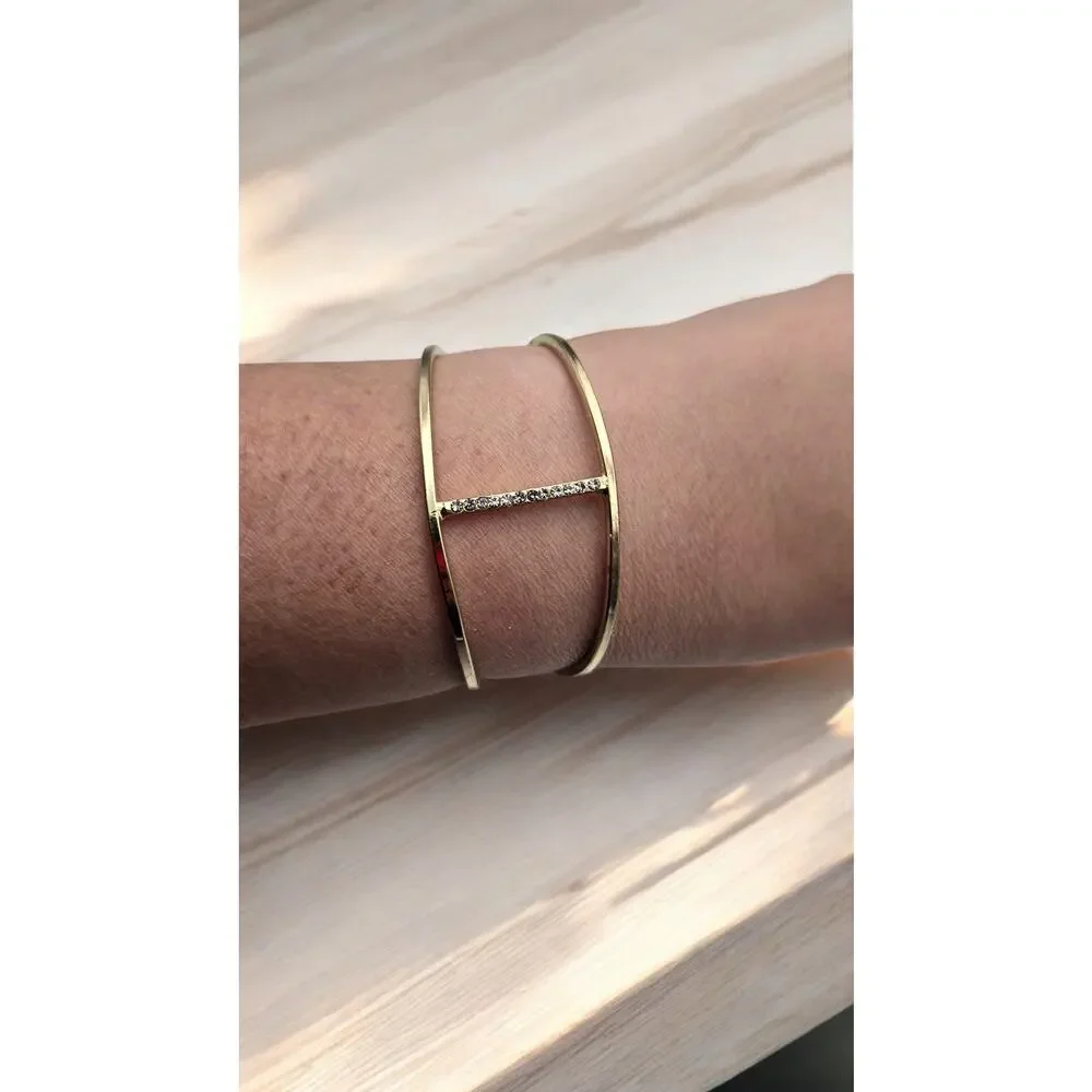 Source Unknown minimalist gold